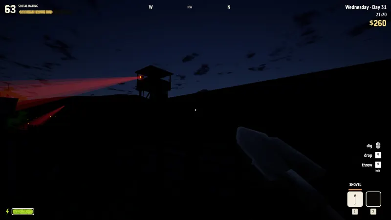 Red searchlights sweep the border fence at night.